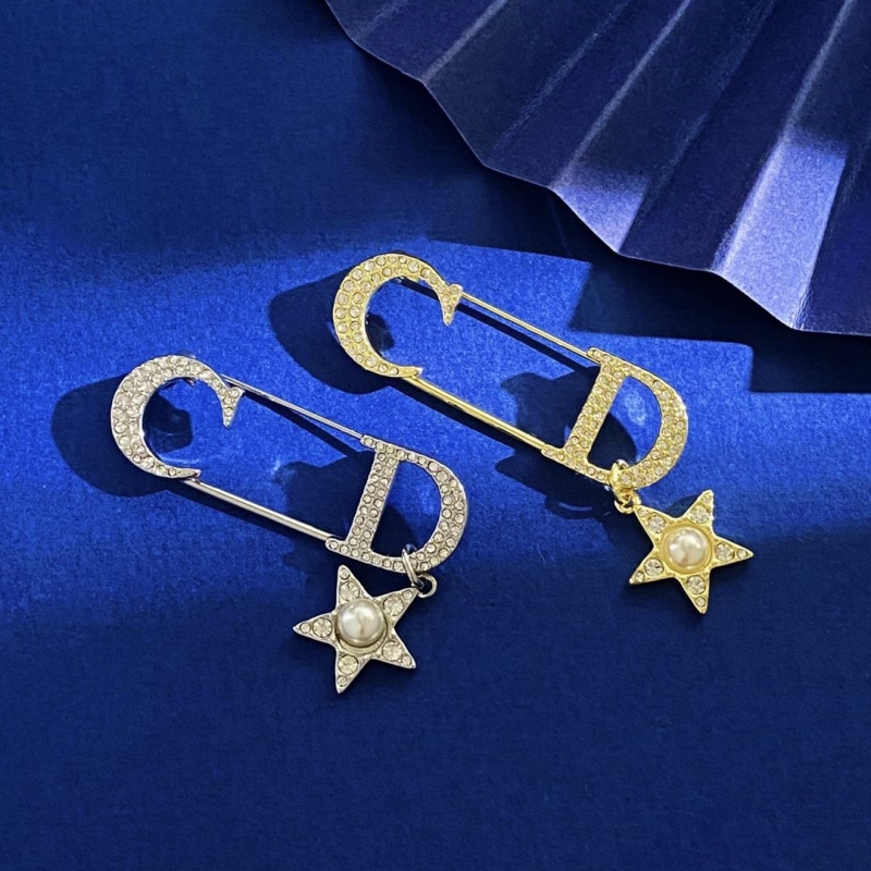 ch**an D*or brooches